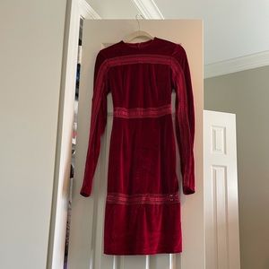 Deep red velvet-like midi dress with see-thru detail, and split sleeve